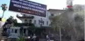 MUĞLA Kafeteryasının girişine maske farkındalığı için pankart astı