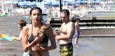 Halk plajına giden Aybüke Pusat, görüntülendiğini görünce küplere bindi
