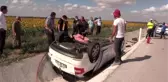 Su kanalına devrilen otomobilde sıkışan sağlık personeli yaralandı