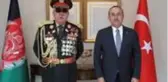 Mevlüt Çavuşoğlu'nun görüştüğü Mareşal Raşid Dostum'un üniformasındaki madalyalar dikkat çekti