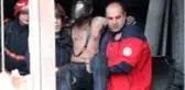 Alevlere teslim olan dükkandan tuvalete sığınarak kurtuldu