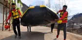 Sporcular 8 Mart Dünya Kadınlar Gününde rafting yapıp pankart açtı