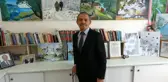 Ressam muhtar, muhtarlığın bir odasını resim sergisine dönüştürdü