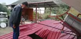 ADANA'DA ŞİDDETLİ RÜZGARIN ETKİSİYLE OLUŞAN HORTUM 2 EVE ZARAR VERDİ