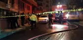 Yangın sonrası binadan çıktı, kedisine sarılarak müdahaleyi takip etti