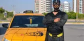 BATMAN KIYAFETİYLE DİREKSİYON BAŞINDA