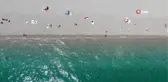 Antalya'da termometreler 39'u gösterdi, vatandaşlar sahile akın etti