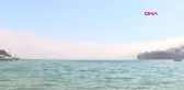 ANTALYA DENİZ ÜZERİNDE ORTAYA ÇIKAN SİS DUVARI TURİSTLERİ ŞAŞIRTTI