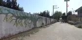 Yaşadıkları sokağı açık hava resim sergisine çevirdiler