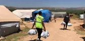 Afrin'de ihtiyaç sahiplerine hijyen paketi ve giysi yardımı yapıldı