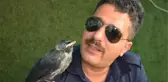 YAVRU KUZGUN KENDİSİNİ KURTARAN İTFAİYECİDEN AYRILMIYOR
