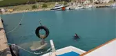 GÖKÇEADA BELEDİYE BAŞKANI ÇETİN, DALIŞ YAPARAK DENİZİ TEMİZLEDİ