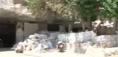 Sıcaklığın 50 dereceyi bulduğu Şanlıurfa'da kurbanlıklar 20 derecelik mağaralarda besleniyor