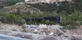 Şarampole yuvarlanan tırın sürücüsü yaralandı