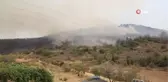 İtfaiye erleri yangını söndürmek için canla başla mücadele ediyor