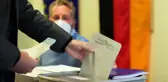 Almanya'daki genel seçimde ilk sandık çıkış anketinde CDU/CSU ile SPD yüzde 25'er oy aldı