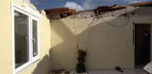 Lodos evlerinin çatılarını uçurdu...Çatının kalan kısmı uçmasın diye kaldırım taşı ile bağladılar