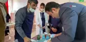 İş önlüğünü giyen kaymakam ebru çalışması yaptı