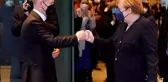 Merkel görevini Başbakan Scholz'a devretti