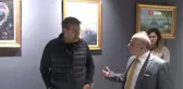 Engelli banka yöneticisi, boş zamanında yaptığı resimlerle sergi açtı