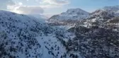 Kar yağışıyla beyaza bürünen Kızıldağ Yaylası'na ziyaretçi ilgisi