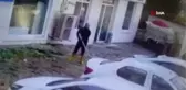 Kaldırımı temizlerken köpeğin saldırısına uğradı