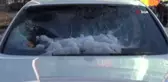 Sultangazi'de çatıdan düşen kar yığını lüks otomobile zarar verdi