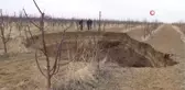 Karaman'da oluşan dev obruk, elma ağaçlarını yuttu