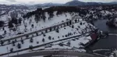 Beyşehir'e gelen leyleklere yuvalarında kar sürprizi
