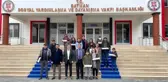 İş insanından 100 başarılı öğrenciye tablet ve giyim yardımı