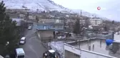 Çiçek açan badem ağaçları kar altında kaldı