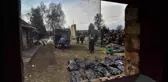 Bucha'da evlerden çıkarılan 28 ceset mezarlığa götürüldü
