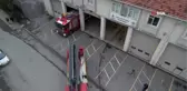 Kulakları ezanda, gözleri yangın ihbar ışığında