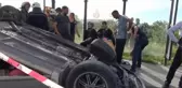 SULTANGAZİ'DE OTOMOBİL TAKLA ATARAK KARŞI YÖNE GEÇTİ ANNE VE OĞLU YARALANDI