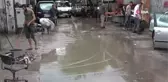 Sağanak yağışın vurduğu Osmaniye'de, sanayi esnafı güne iş yerlerini temizleyerek başladı