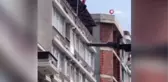 5 katlı binanın çatısında intihar girişiminde bulunan kadın polis tarafından kurtarıldı
