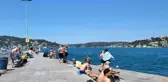 Sıcaktan bunalan İstanbullular soluğu sahillerde aldı