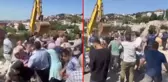 Kentsel dönüşüm gerginliği! Mahalleli yıkım için gelen ekiplere engel oldu, arbede sırasında polis havaya ateş açtı