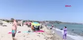 MARMARAEREĞLİSİ'NDE SICAKTAN BUNALANLAR, SOLUĞU DENİZDE ALDI