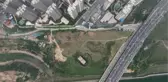 ZHENGZHOU - Çin'in Henan eyaletinde gökdelenlerin arasında kalan bina