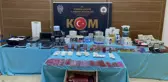 İstanbul'da sahte etiket ve bandrol üreten 2 zanlı yakalandı