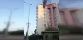 Alevler arasında mahsur kalan felçli kadını komşusu kurtardı
