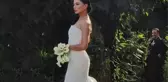 Oğuzhan Koç ile nikah masasına oturan Demet Özdemir'in gelinliği alay konusu oldu