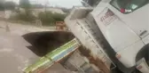 Denizli'de Kamyon Aşırı Yağıştan Çöken Yola Düştü