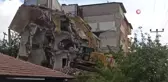 Ağır hasarlı binanın yıkımı sırasında operatör yaralandı