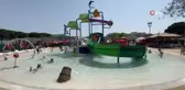 Aydınlı çocuklar Büyükşehir Belediyesi'nin aquaparkı ile serinliyor