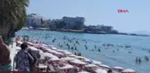 Kuşadası'nda Sıcak Hava Plajları Doldurdu
