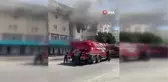 Antalya'da çıkan yangında balkonda mahsur kalan kadını itfaiye kurtardı