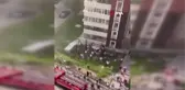 Yangından kaçan kadın ve çocuk metrelerce yüksekten aşağı atladı