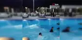 Oğlunun sünnet düğününde babayı elbiseleriyle havuza attılar